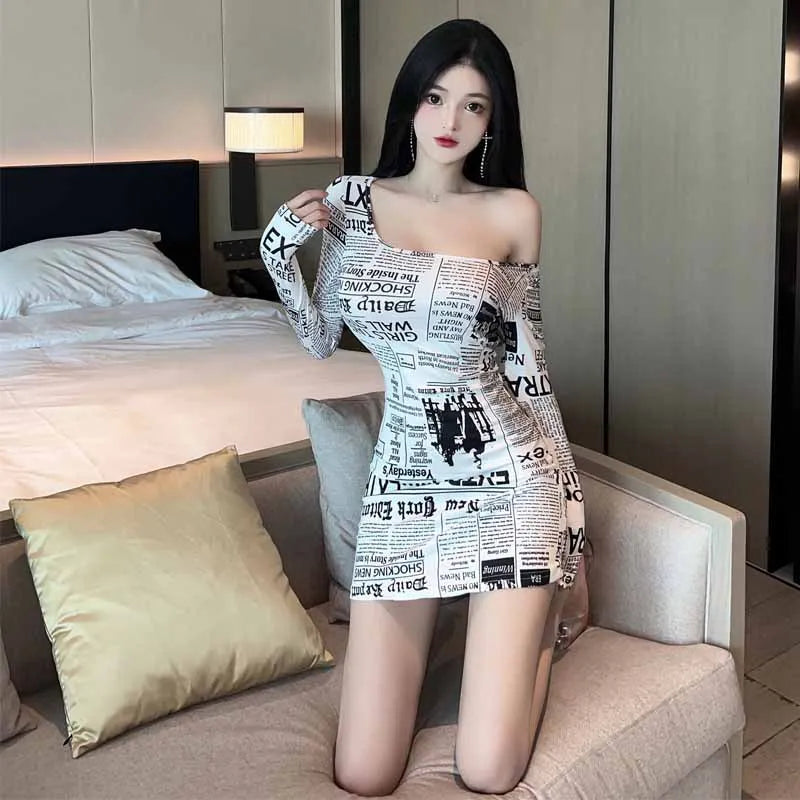 8186Europe and America2026Cross-border foreign trade American-style spicy girl newspaper print slimming long-sleeve dress trendy